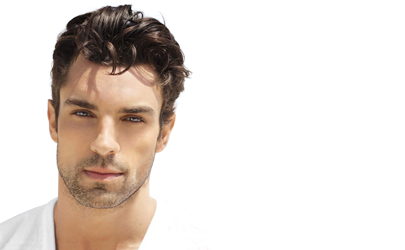 Male model using concealer to cover dark circles under eyes